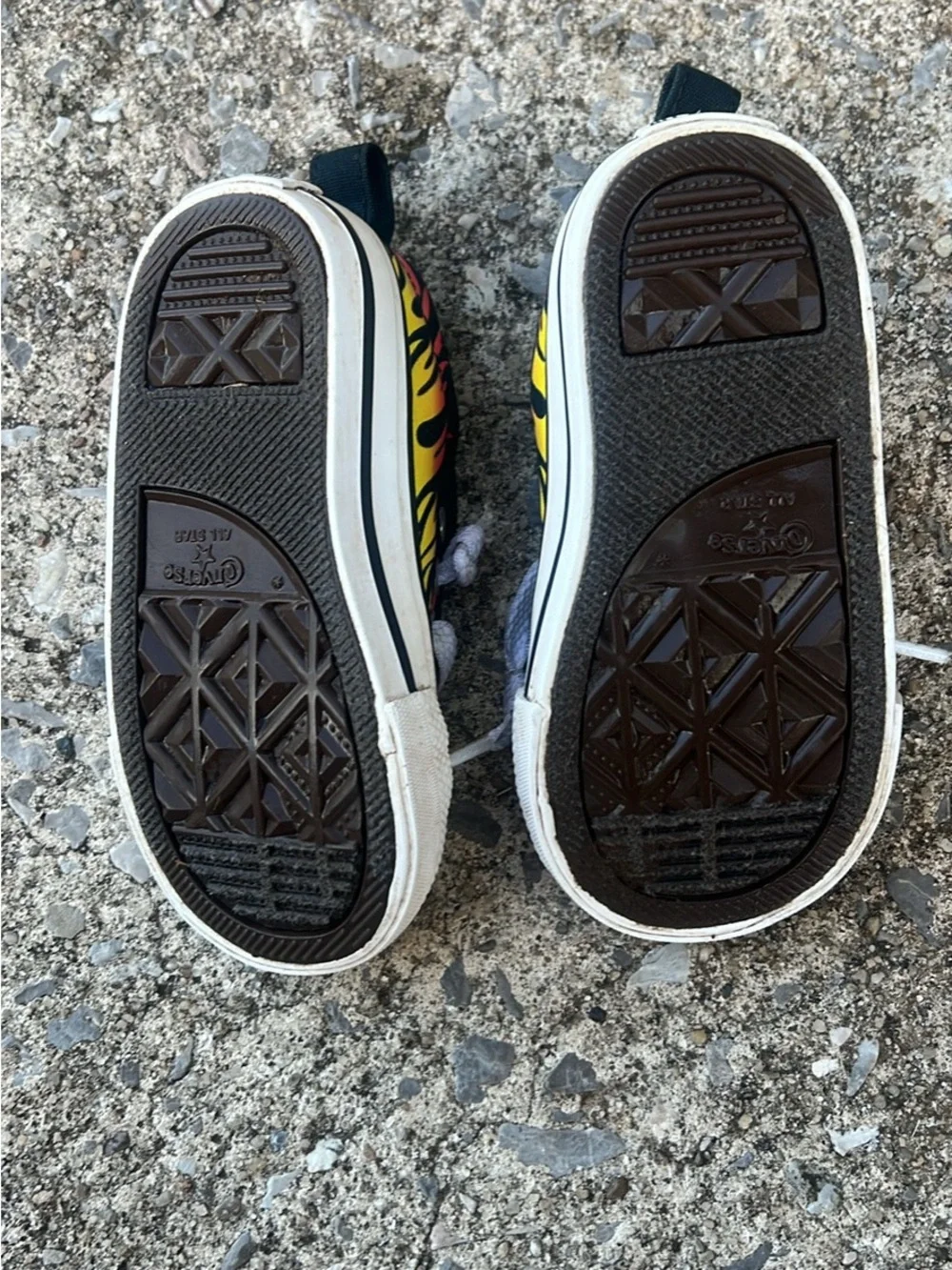 Converse Kids Low-Top Sneakers in Black with Red and Yellow Flame Print